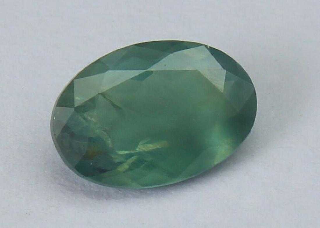 0.83 Ct Alexandrite: New to Jasper52 Item: 0.83 Ct Alexandrite Color/Clarity: Green / Brownish Red / Transparent Gemstone Type: Alexandrite (India) Carat Weights: 0.83 Size (mm): 7.46x5.16x2.52 Additional Info/Certificate