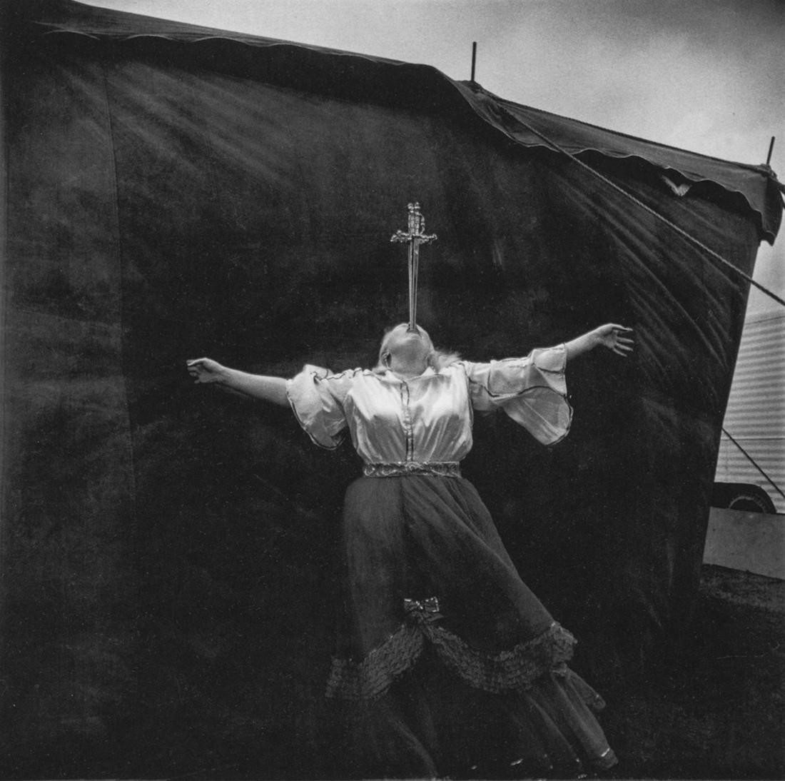 DIANE ARBUS - Albino Sword Swallower, Carnival, 1970: Artist: Arbus, Diane Title: Albino Sword Swallower, Carnival, Maryland, 1970 Medium: Photo Litho, 1975, USA Dimensions: 5.95x5.9" Heat Wax Mounted on 8.5x11" Conservation Board Diane Arbus was an Amer