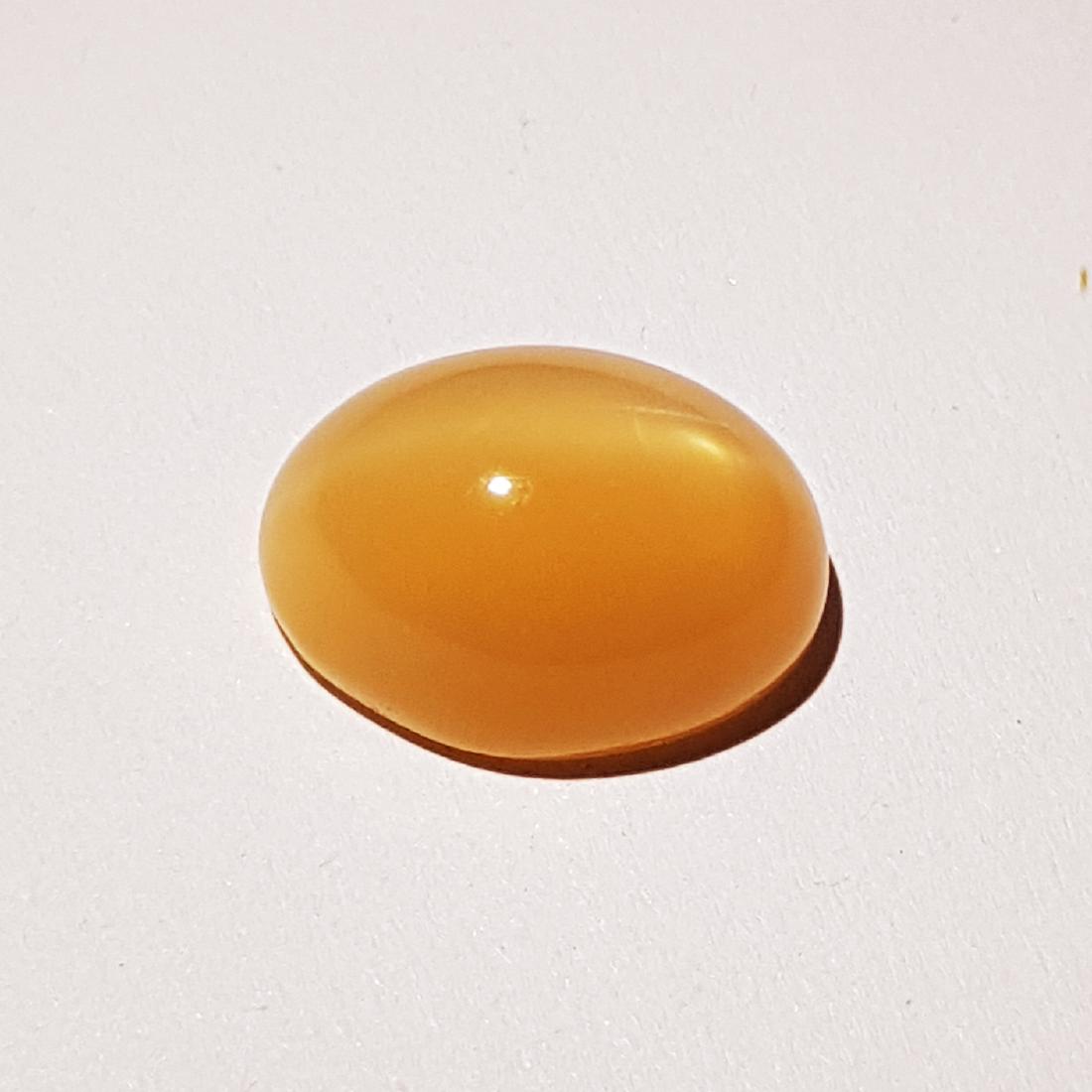 14.29 ct Natural Orange Moonstone: No Reserve! Item: 14.29 ct Natural Orange Moonstone Color/Clarity: VVS Loose gemstone Carat Weight: 12.29 Size (mm): 16.70 x 12.50 x 8.40 Oval - India Shipping: Worldwide: Flat-rate of $10.00 to anywh