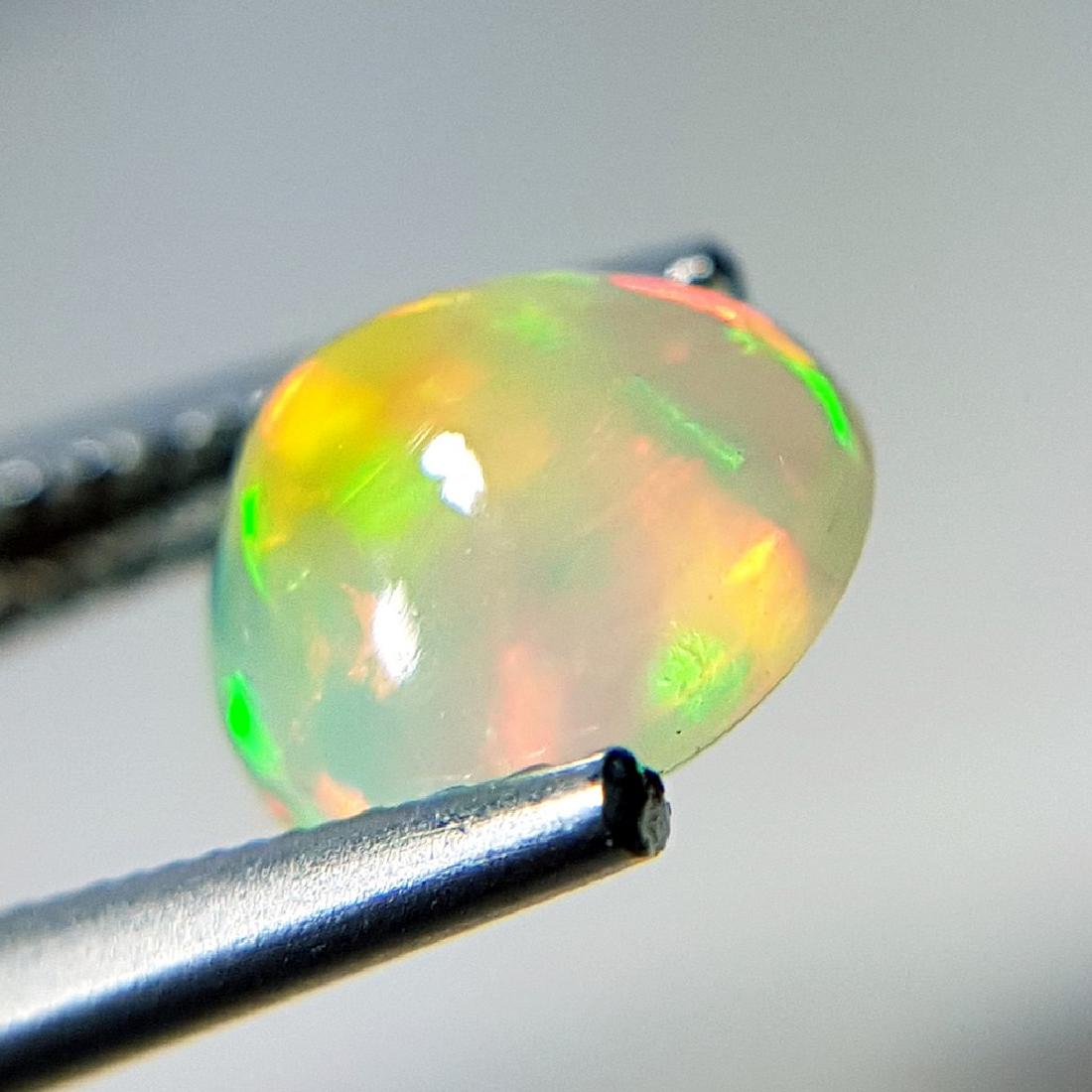 1.06 ct Exclusive Fire Round Cabochon Natural Opal (1 of 8)