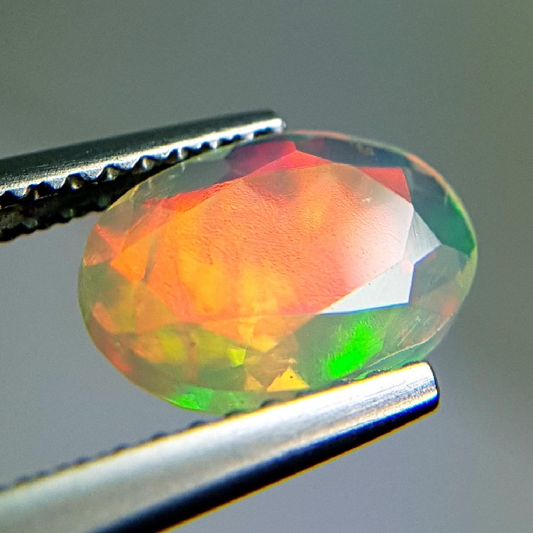 0.98 ct Awesome Fire Oval Cut Natural Opal (1 of 9)