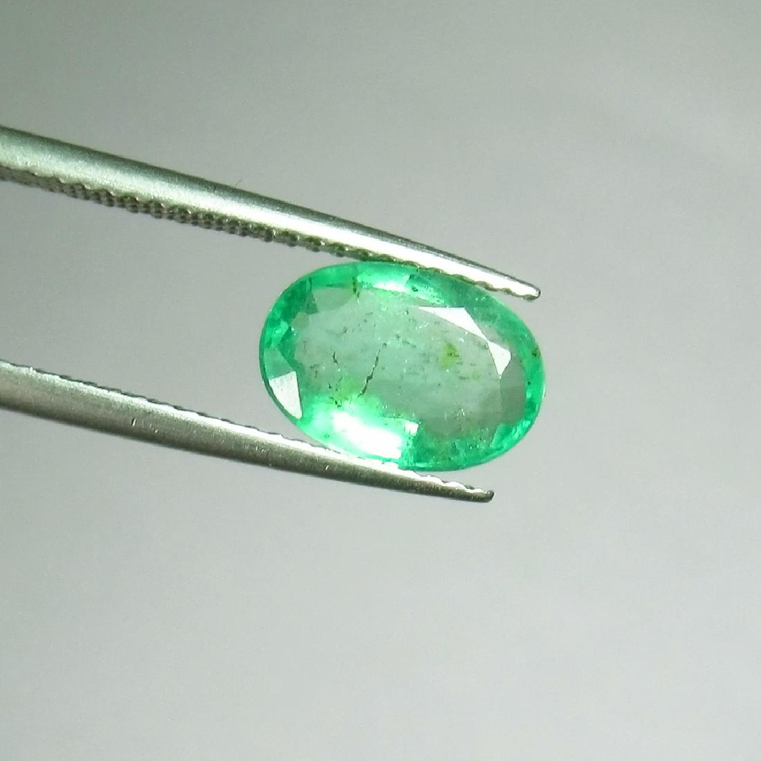 1.89 Ct Genuine Colombian Emerald 10X7 mm Oval Cut: No Reserve! Title: 1.89 Ct Genuine Colombian Emerald 10X7 mm Oval Cut Natural Emerald Oval Stone Clarity: SI Gemstones: Emerald Carat Weights: 1.89 Size/Dimensions: 9.90 x 6.90 x 4.00 mm Additional In