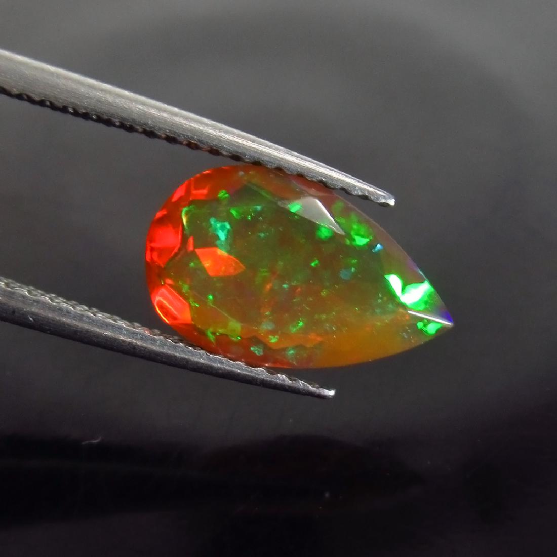 1.55 Ct Genuine Ethiopian Faceted Honey Opal 12x7.5 mm (1 of 2)