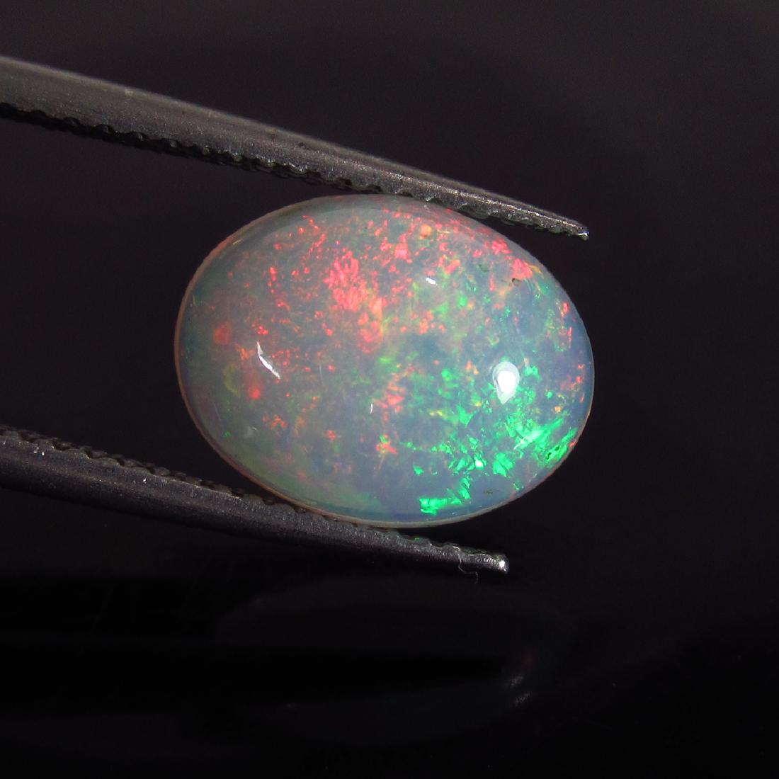 2.36 Ct Genuine Ethiopian Multi-Color Fire Opal Oval (1 of 2)