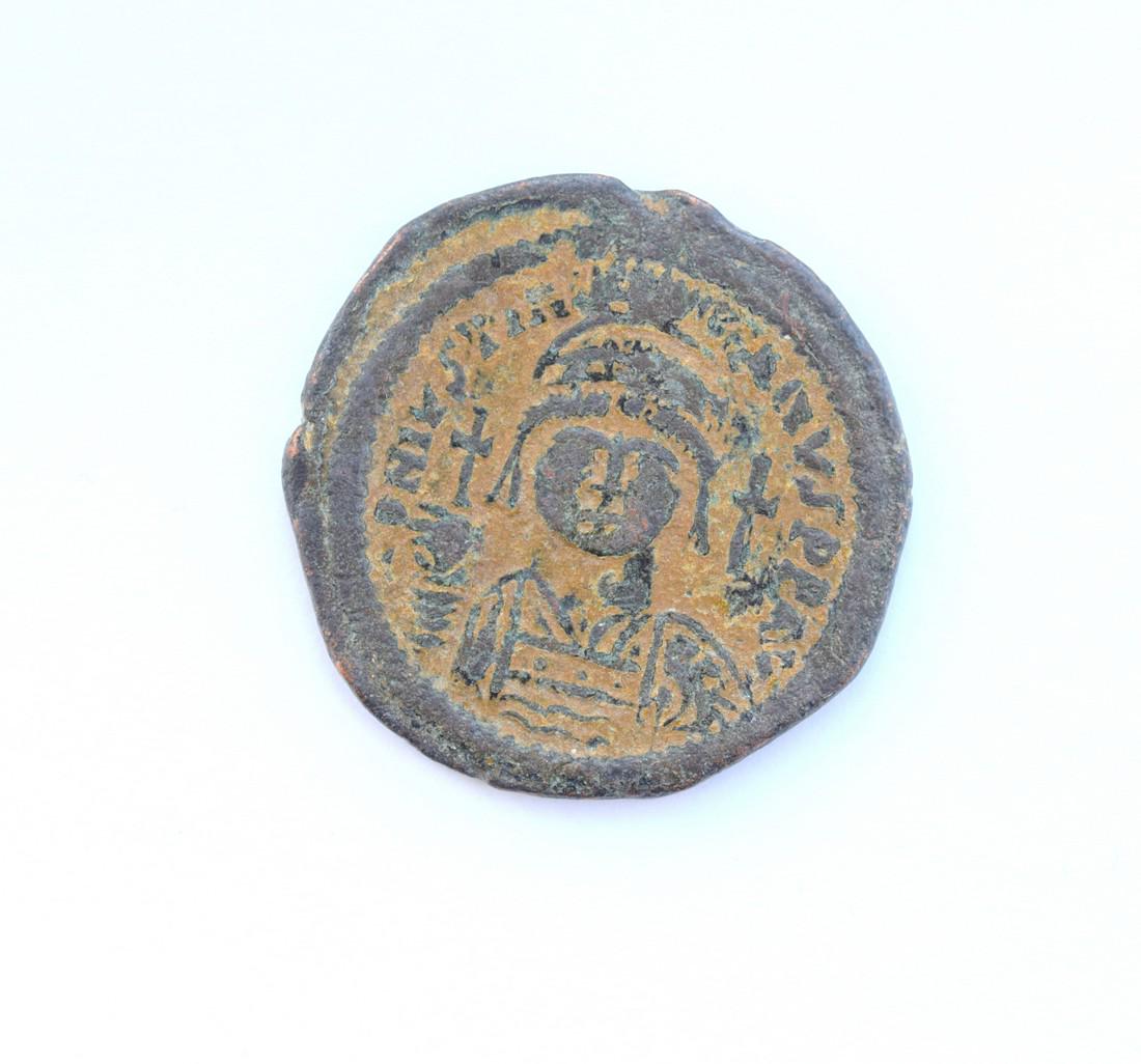 Justinian I. 527-565. Æ Follis: Justinian I. 527-565. Æ Follis. Origin: Constantinepolis. Date: 527-565 AD CONSTANTINOPLE. Weight: 18. 78 gr. Size: 42 x 42 mm. Byzantine period coin genuine. Reserve: $55.00 Shipping: Domestic: Flat