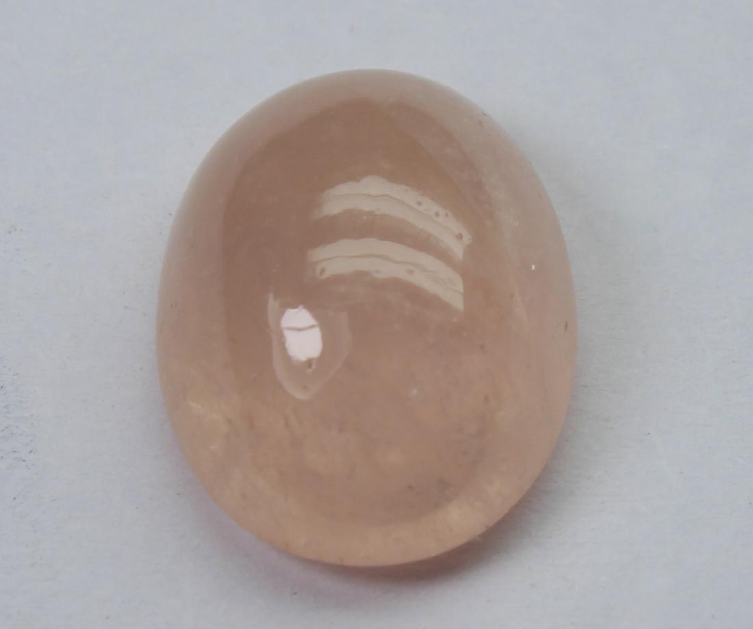 9.80 Natural Morganite: No Reserve! "Gemstone: Natural Morganite Origin: Africa Weight: 9.80 Carats Measurements: 16x12x7.1 mm Shape : Oval Cabochon Colour: Peach Pink Transparency: transparent Clarity: natural inclusions vi
