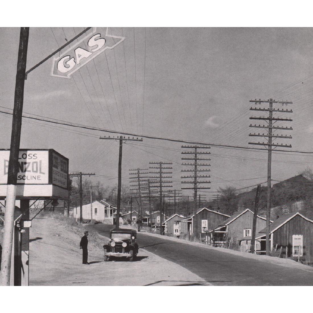 WALKER EVANS - Roadside View, Alabama: Artist: WALKER EVANS Print Title: Roadside View, Alabama Coal Area company Town, 1936 Medium: Photo-engraving Printing Date: 1930's Printed in the USA Image Size: 7 X 5.75 inches Walker Evans (1903-19