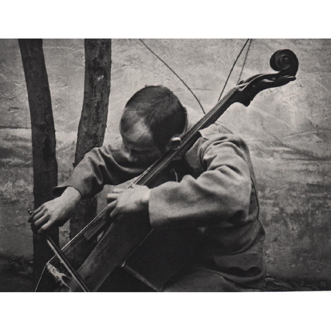 ANDRE KERTESZ - The Drafted Gypsy, 1916: Artist: ANDRE KERTESZ Print Title: The Drafted Gypsy, Esztergom 1916 Medium: Sheet-Fed Gravure Printing Date: 1970's Printed in France Image size approx. 9 x 7 inches Andre Kertesz (1894-1985) born Ke