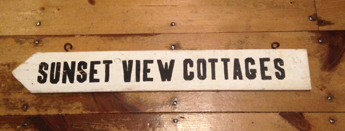 Pine cottages arrow sign (1 of 6)