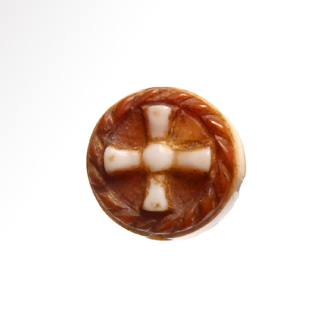 Byzantine Agate Cameo with Cross, c. 8th-10th Century: Byzantine Agate Cameo with Cross, c. 8th-10th Century A.D.. Date & Origin: Byzantine, c. 8th-10th Century A.D.. Cut in cameo style with a cross in the white layer and a wreath in the red, pierced for 