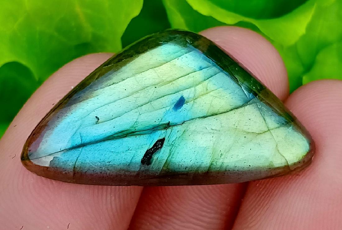 18.85 ct Gorgeous Natural Labradorite Cab~: No Reserve! Reserve Reduced! Title: No Reserve 18.85 ct Gorgeous Natural Labradorite Cab~ Africa Color/Clarity: None Gemstones: Labradorite Carat Weights: 18.85 Carat Size/Dimensions: 30x16x5 mm Origi