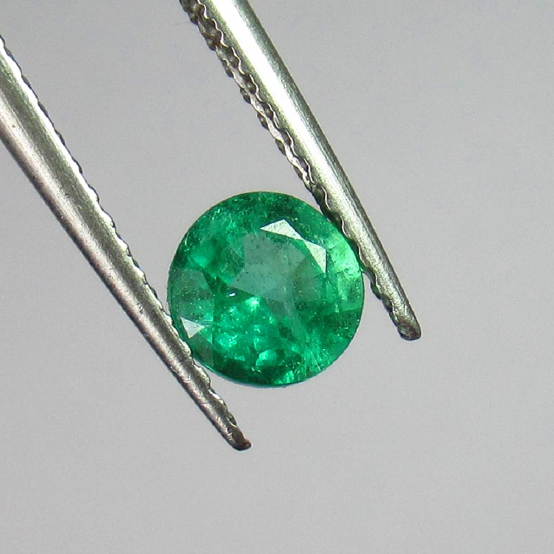 0.60 Ct Genuine Zambian Emerald 5.2 mm Round Cut (1 of 2)
