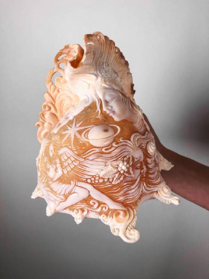 Mystical Cameo & Intaglio - Carved Cassis Cornute Shell: Reserve Reduced! Title: Mystical Cameo & Intaglio - Carved Cassis Cornute Shell with Angelic Depiction Maker: Sooka Interior Origin: Indonesia Date/Period: 2016 Materials: Cassis Cornute (Horned Helme