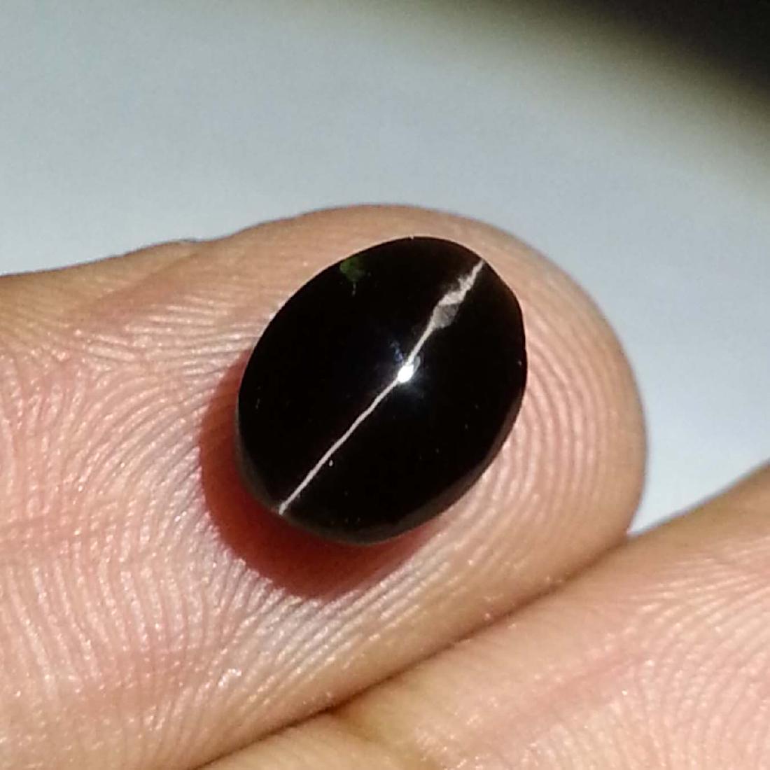 Fantastic Sillimanite Cat's Eye - 2.59 ct: No Reserve! Item: Fantastic Sillimanite Cat's Eye - 2.59 ct Color/Clarity: Opaque Loose gemstone Carat Weight: 2.59 Size/Dimensions: 9.20 x 7.10 x 4.50 Oval - Africa Shipping: Domestic: Flat-rate of $