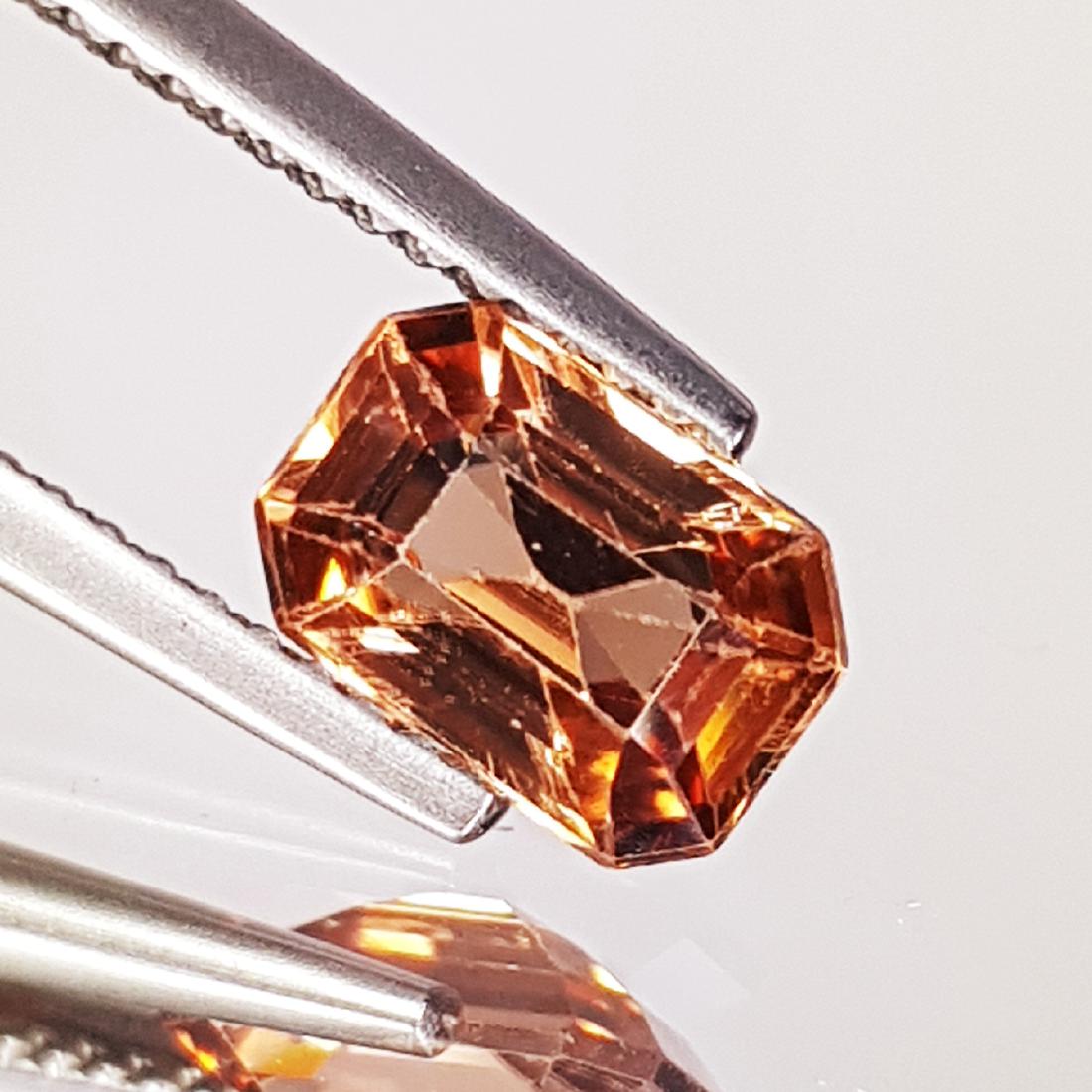1.90 ct Collective Gem Natural Pink Zircon: No Reserve! Item: 1.90 ct Collective Gem Natural Pink Zircon Color/Clarity: VVS Loose gemstone Carat Weight: 1.9 Size/Dimensions: 8.02 x 5.56 x 3.71 Emerald - Cambodia Shipping: Domestic: Flat-rate of