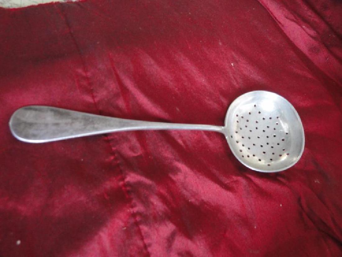 Russian antique silver 84 tea strainer: RUSSIAN 84 SILVER AND INITIAL STAMP TEA STRAINER 6 " ( 15 CM) LONG AND 36 G WEIGHT CIRCA 1880 Reserve: $75.00 Shipping: Domestic: Flat-rate of $6.00 to anywhere within the contiguous U.S. Internationa