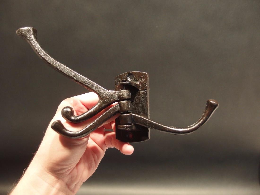 Cast Iron Wall Hook Swivel Folding Coat Hanger Hardware: 1) Hook Back plate is 3 1/4" Tall.. 1 5/8" Wide 6" Extension Great sturdy iron wall hook cast from an antique. 3 folding arms Great black finish! Reserve: $15.00 Shipping: Domestic: Flat-rate of $8.00