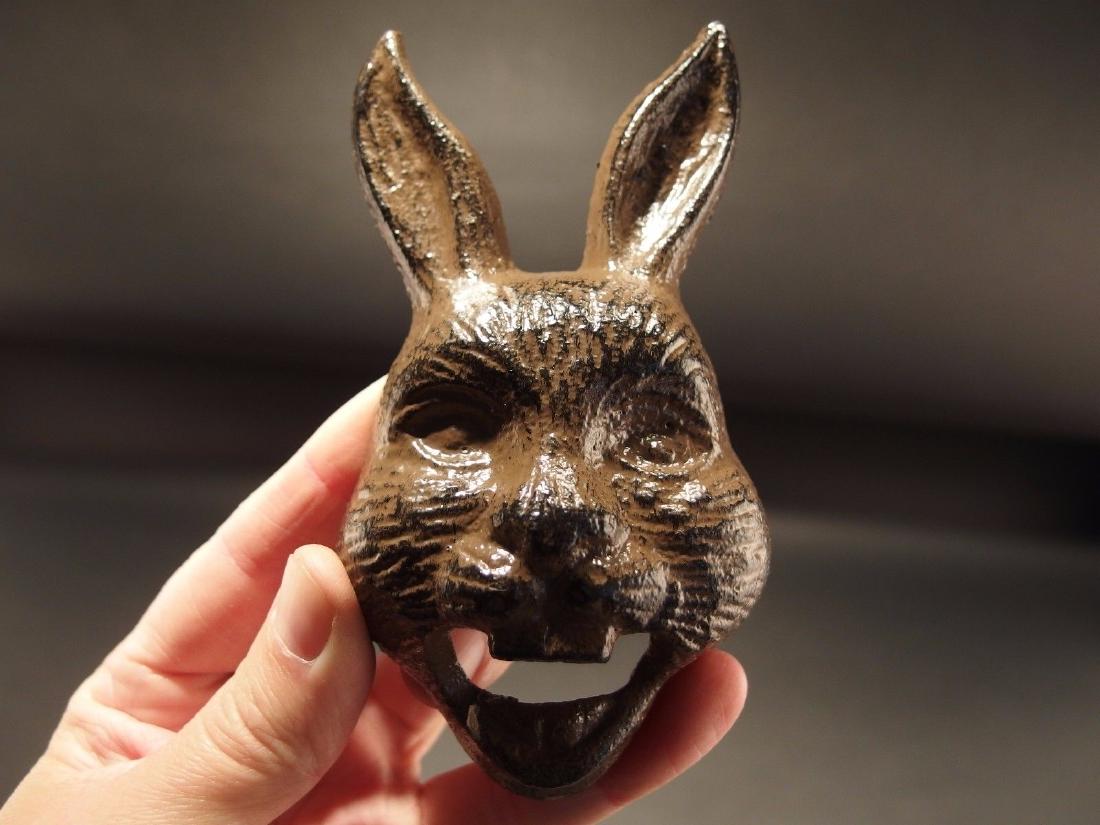 Cast Iron wall mount folk art Rabbit Beer Bottle Opener: 5 1/2" Tall x 2 7/8" Wide Great reproduction cast iron bottle opener. This piece was made to look just like an antique, but is new. Reserve: $8.00 Shipping: Domestic: Flat-rate of $5.00 to anywhere wi