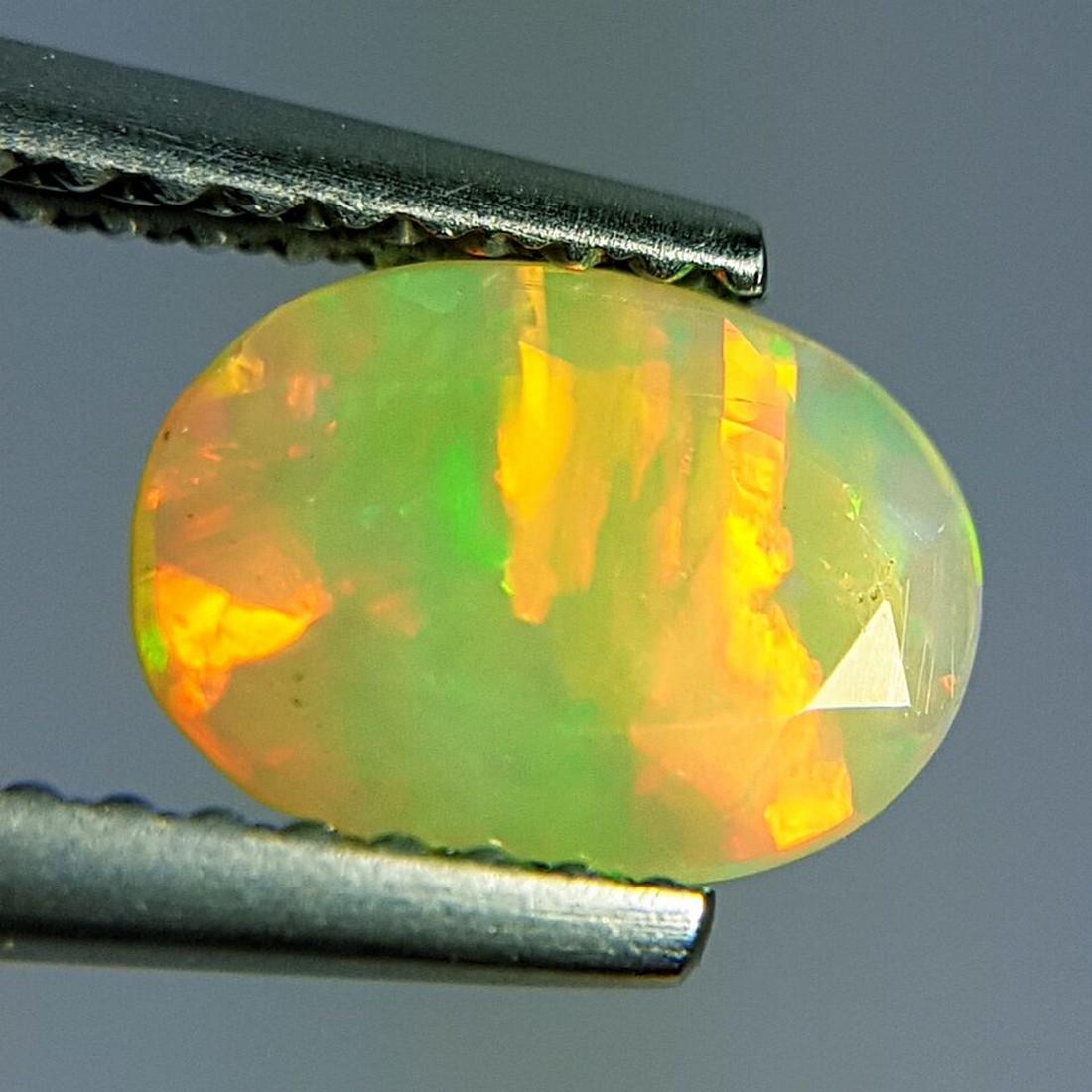 0.77 ct Ultra Fire Oval Cut Natural Opal (1 of 11)