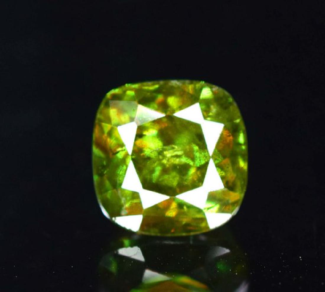 1.85 cts Cushion Cut Rare Extreme Full Fire Green: Reserve Reduced! 1.85 cts Cushion Cut Rare Extreme Full Fire Green Sphene Titanite Loose Gemstone ~ Dimensions- 7*7*5 mm Origin : Skardu Pakistan Treatment : Natural DHL Global Shipping Reserve: $50.0