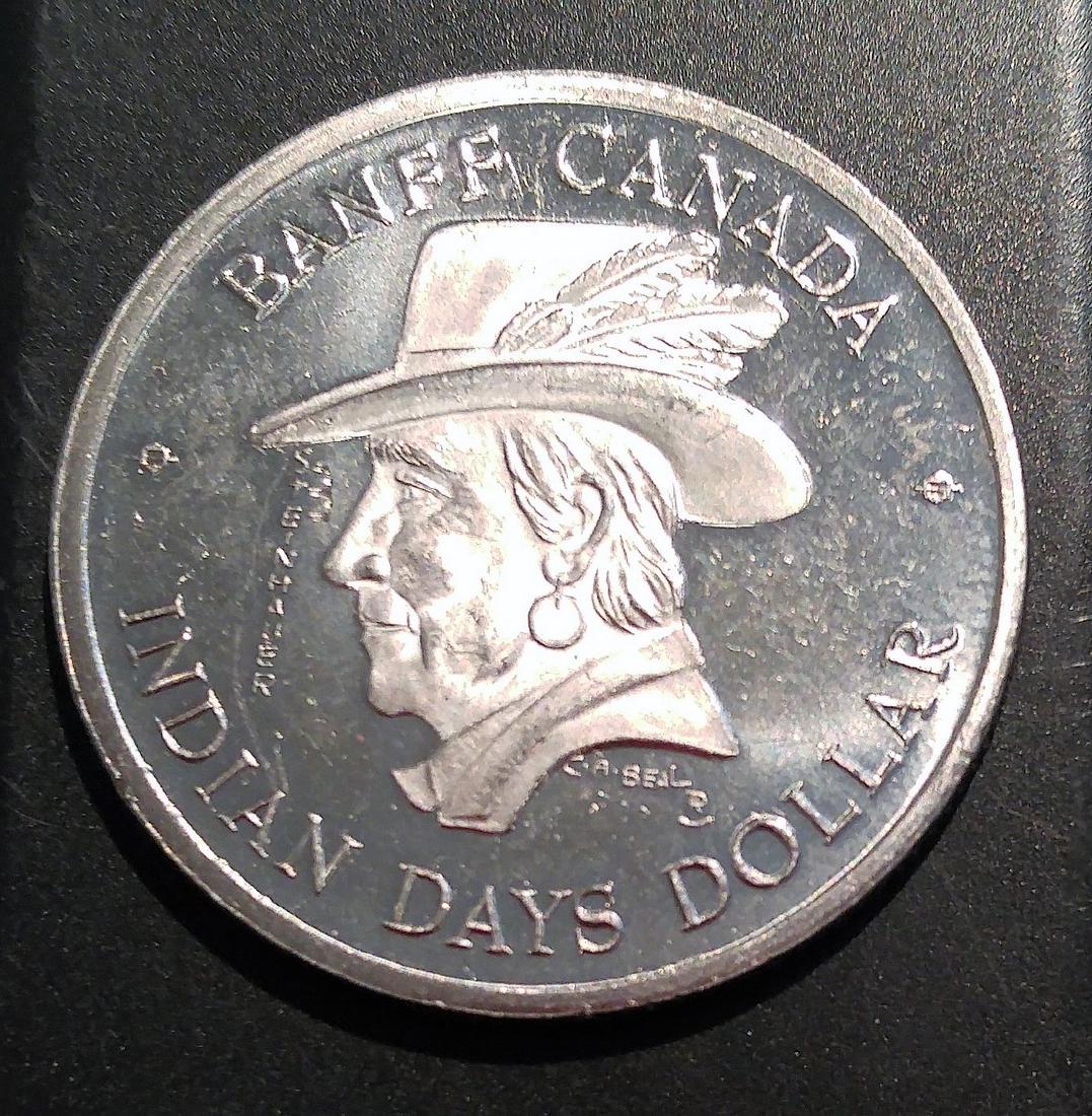 INDIAN DAYS DOLLAR -BANFF ALBERTA: No Reserve! INDIAN DAYS DOLLAR -BANFF ALBERTA 1975 Canada Nickle-Copper 14.0 g 33 mm Commemorative Issue - Banfff Winter Festiveal and appointment of Lieutenant-Governor Steinhauer Shipping: Domestic: