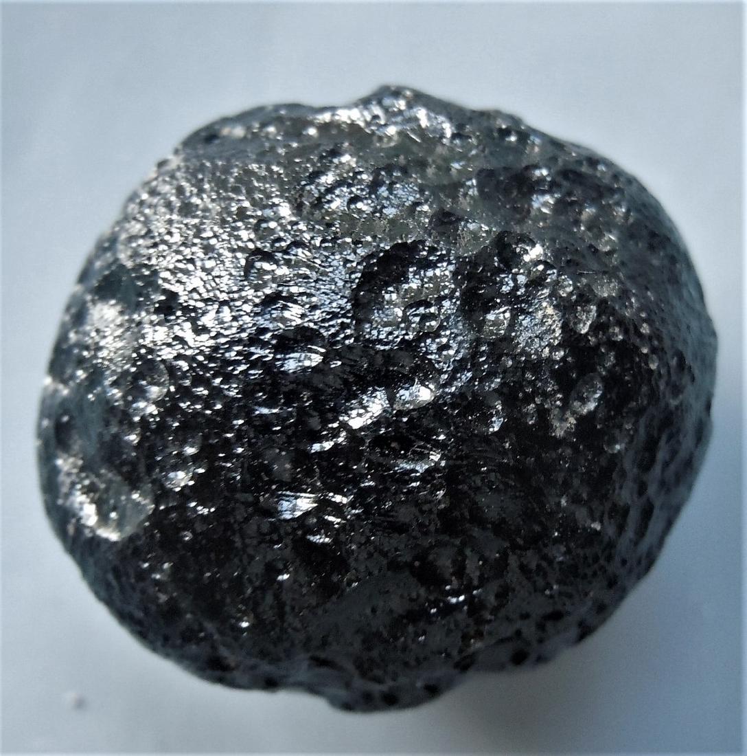 GLOSSY RIZALITE TEKTITE - FROM METEORITE IMPACT: Title: GLOSSY RIZALITE TEKTITE - FROM METEORITE IMPACT Origin: Paracale, Camarines Norte, Luzon, Philippines Size: 2.6x2.6x2.4 cm / 22 gram glossy eggshaped rizalite tektite, Nicely ornamented & flawl