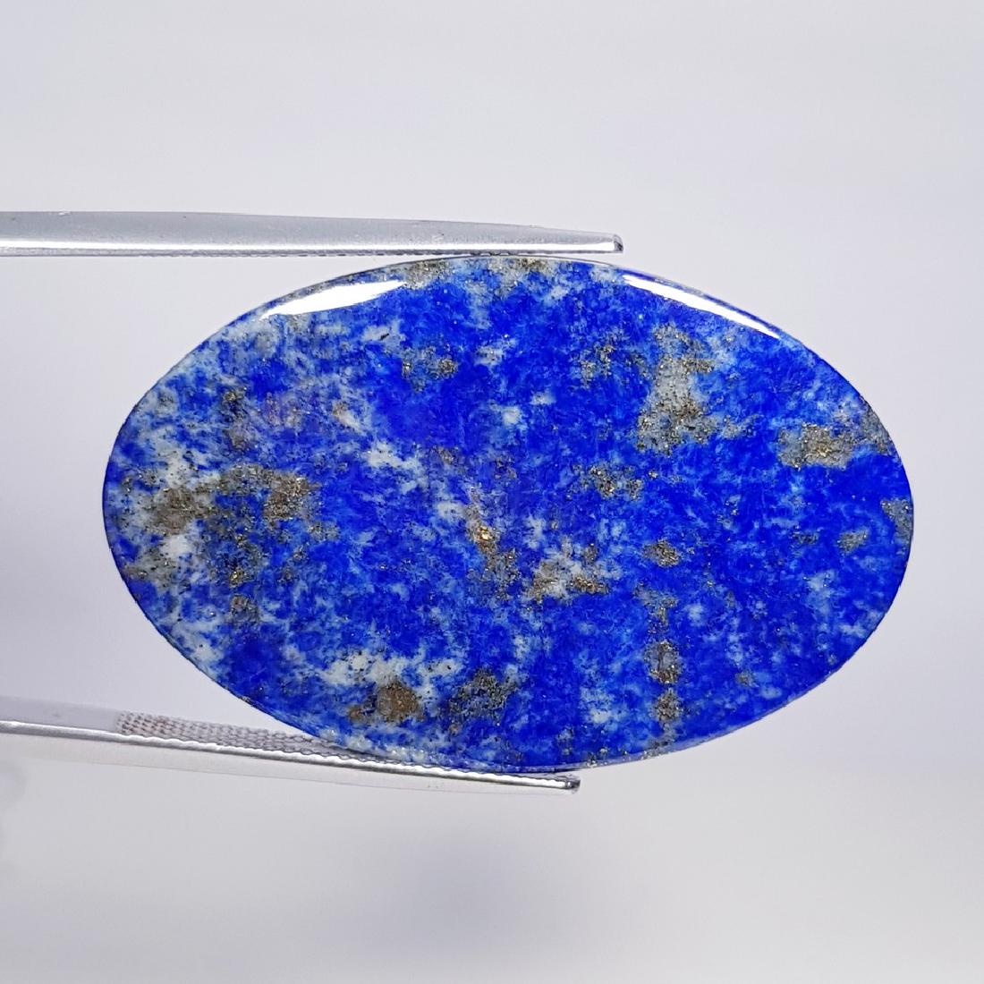 25.50 ct Natural Lapis Lazuil: No Reserve! Item: 25.50 ct Natural Lapis Lazuil Color/Clarity: Opaque Loose gemstone Carat Weight: 25.5 Size/Dimensions: 36.93 x 24.15 x 2.65 Oval - Afghanistan/Chile Shipping: Domestic: Flat-rate of 
