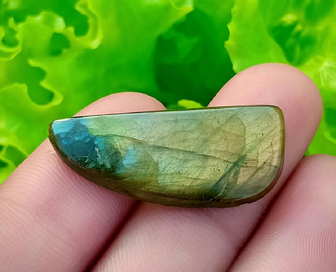 17.20 Carat Stunning Natural Labradorite Cab~ Africa: No Reserve! Title: 17.20 Carat Stunning Natural Labradorite Cab~ Africa Color/Clarity: None Gemstones: Labradorite Carat Weights: 17.20 Carat Size/Dimensions: 33x13x4 mm Origin: Africa Treatment: Natu
