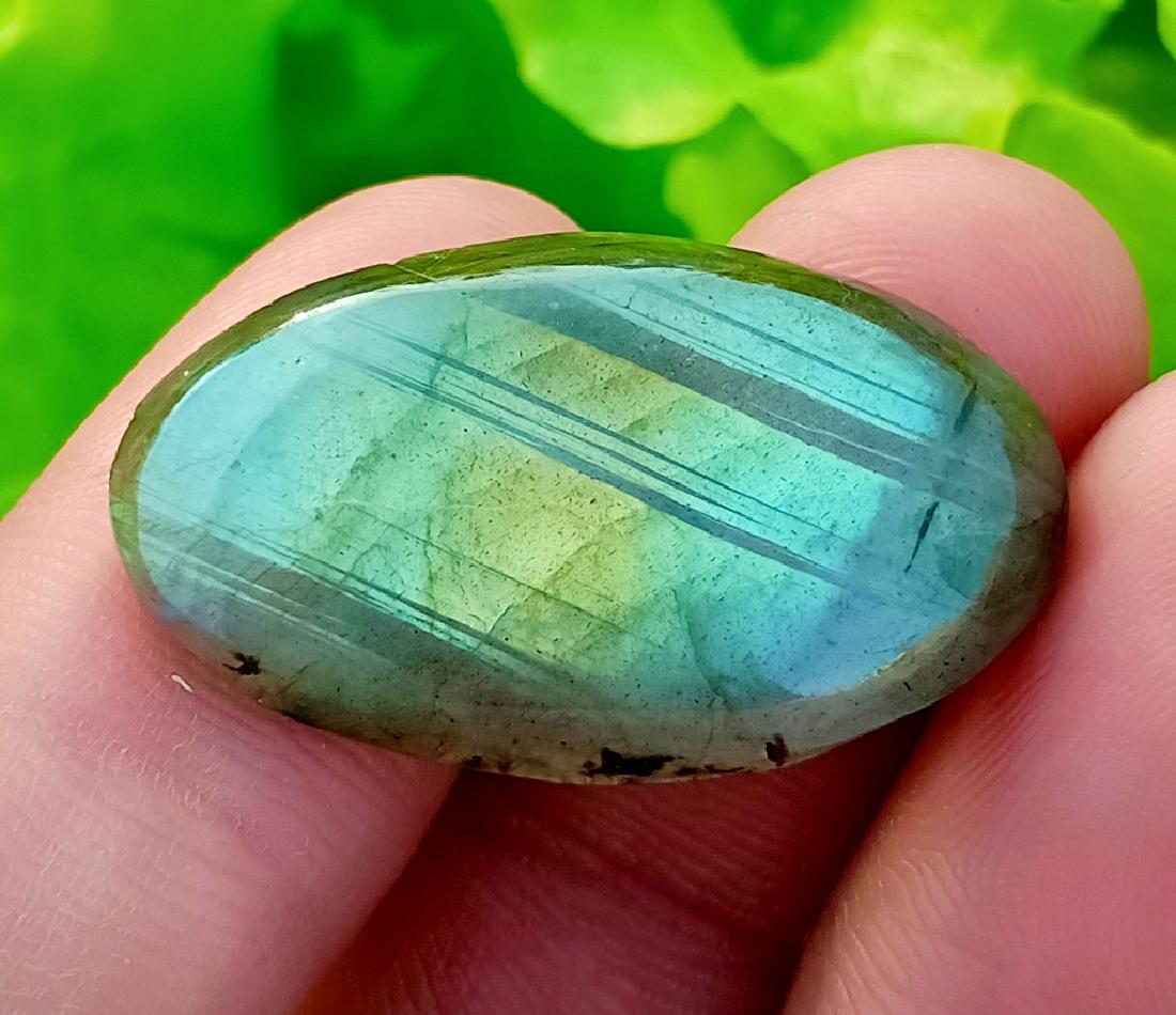 22.45 Carat Stunning Natural Labradorite Cab~ Africa: No Reserve! Title: 22.45 Carat Stunning Natural Labradorite Cab~ Africa Color/Clarity: None Gemstones: Labradorite Carat Weights: 22.45 Carat Size/Dimensions: 39x17x5 mm Origin: Africa Treatment: Natu