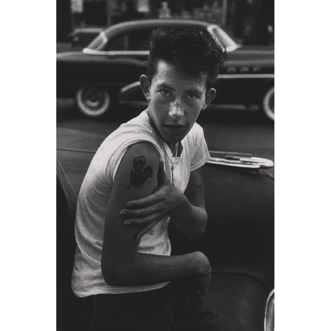 BRUCE DAVIDSON - Tattoo: Artist: BRUCE DAVIDSON Print Title: Tattoo Medium: Sheet-fed Gravure Printing Date: 1990's Printed in Japan Image Size: 5.5 x 8 inches Bruce Davidson (b. 1933) is an American photographer. He has been