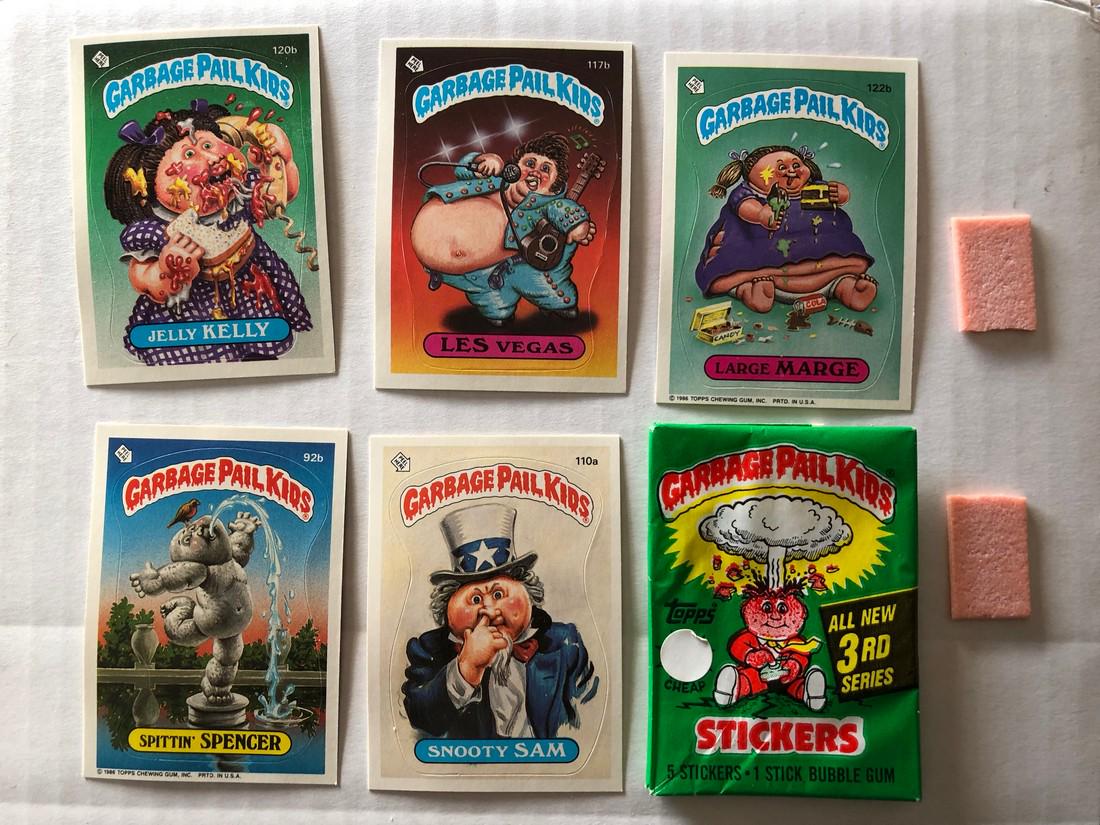 GARBAGE PAIL KIDS CARD SET: Title: GARBAGE PAIL KIDS CARD SET Medium: Size/Format: CARD GARBAGE PAIL KIDS CARD SET - Series 3 - 1986 Topps Chewing Gum Inc. Contains cards, 120b, 117b, 122b, 92b, 110a and original packaging with