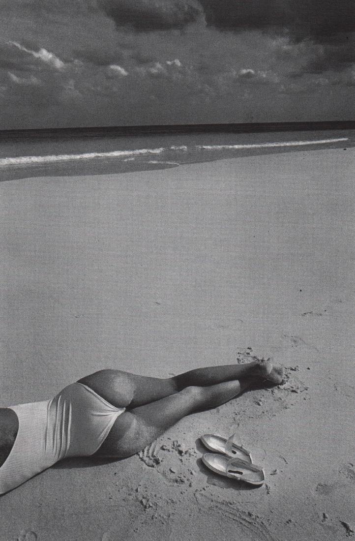 JEANLOUP SIEFF- On the beach: Artist: JEANLOUP SIEFF Print Title: On the beach Medium: Photolitho Printed 1980’s in Italy Image size (inches) approx. 8 x 5” Jeanloup Sieff (1933-2000) was a French photographer born to Polish