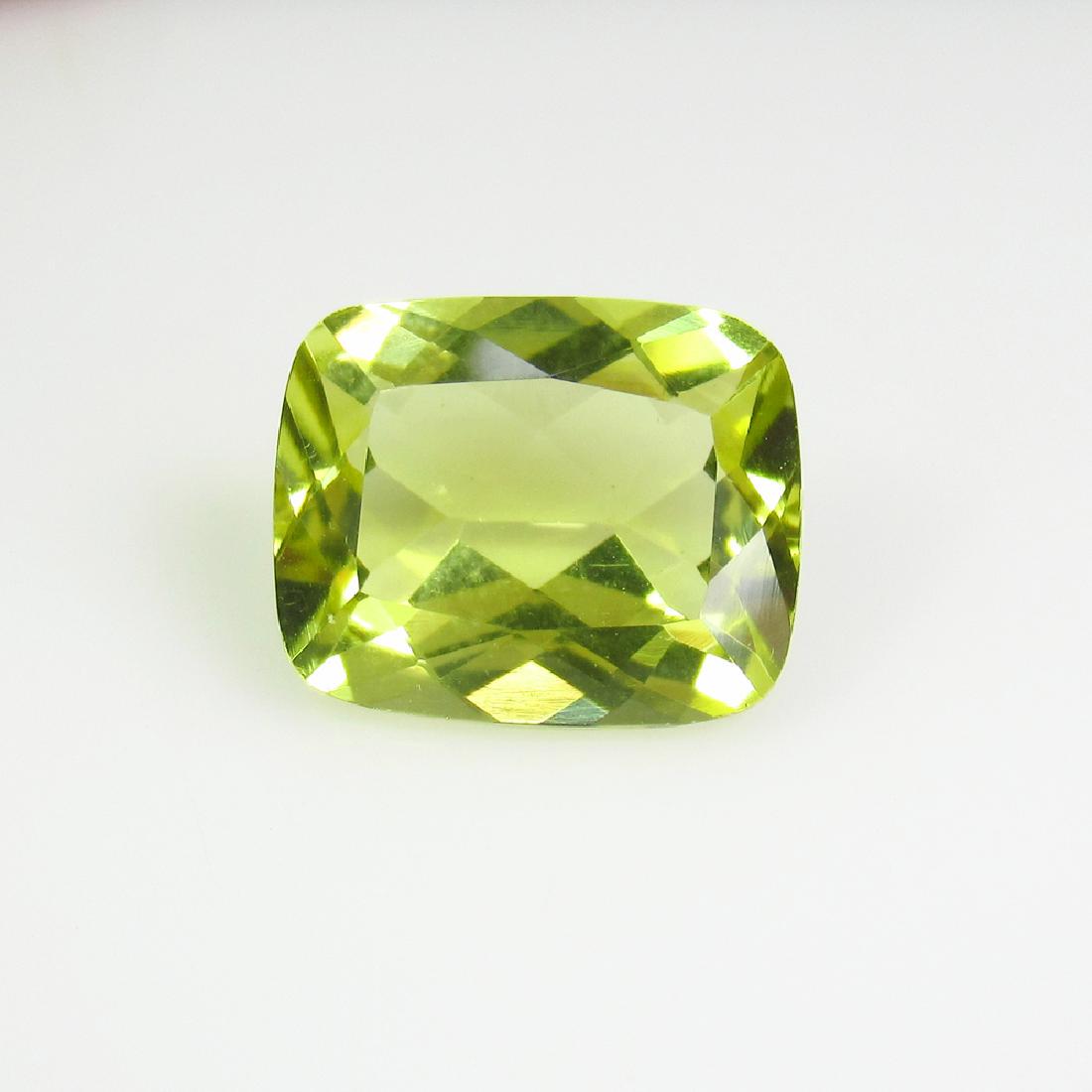 4.79 Ctw Natural Lemon Quartz 12X10 mm Cushion Cut: No Reserve! Title: 4.79 Ctw Natural Lemon Quartz 12X10 mm Cushion Cut Natural Lemon Quartz Stone Clarity: IF Gemstones: Lemon Quartz Carat Weights: 4.79 Size/Dimensions: 12.10 x 10.00 x 6.10 mm Additi