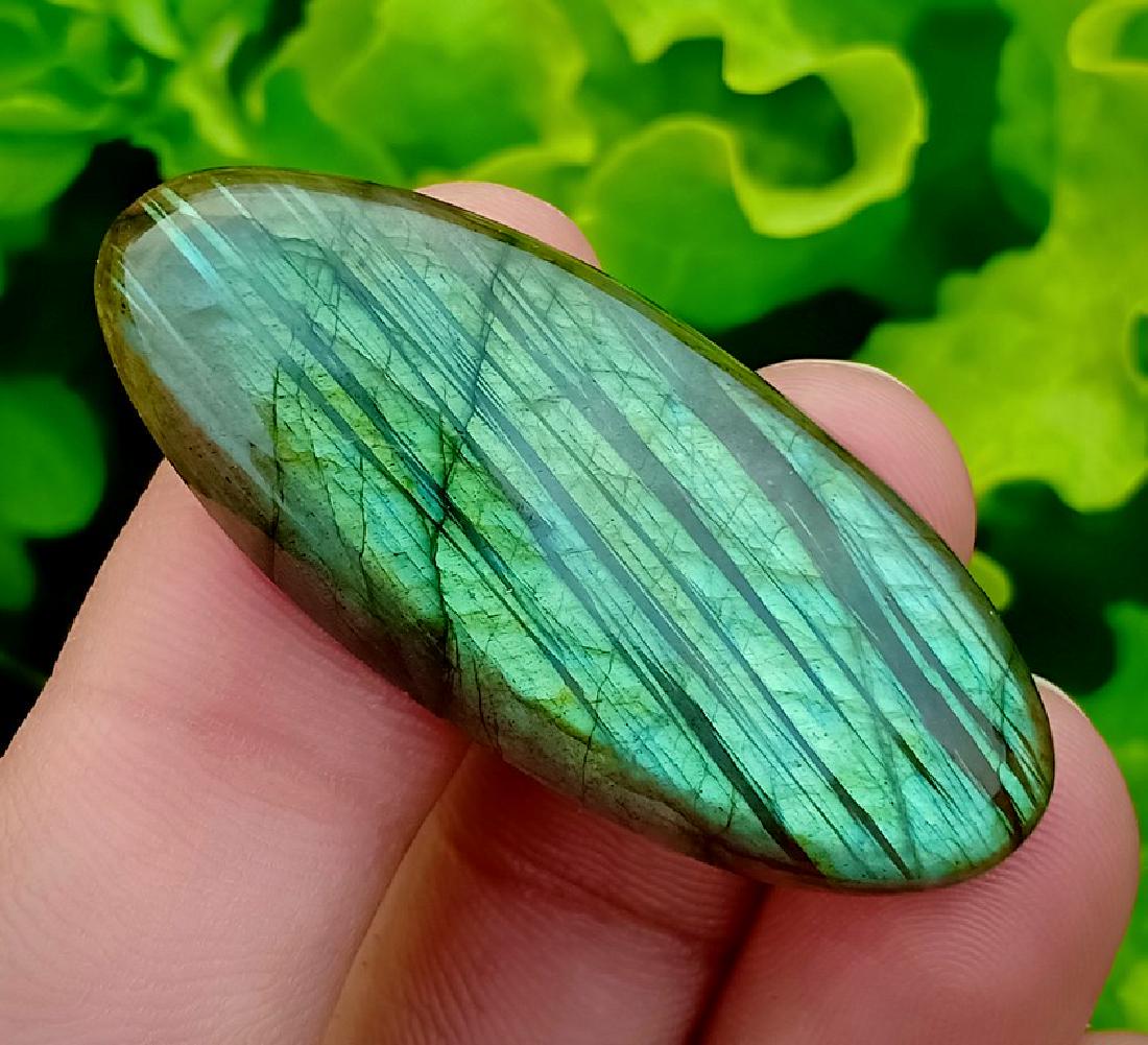 47.35 Carat Stunning Natural Labradorite Cab~ Africa: No Reserve! Title: 47.35 Carat Stunning Natural Labradorite Cab~ Africa Color/Clarity: None Gemstones: Labradorite Carat Weights: 47.35 Carat Size/Dimensions: 44x18x7 mm Origin: Africa Treatment: Natu