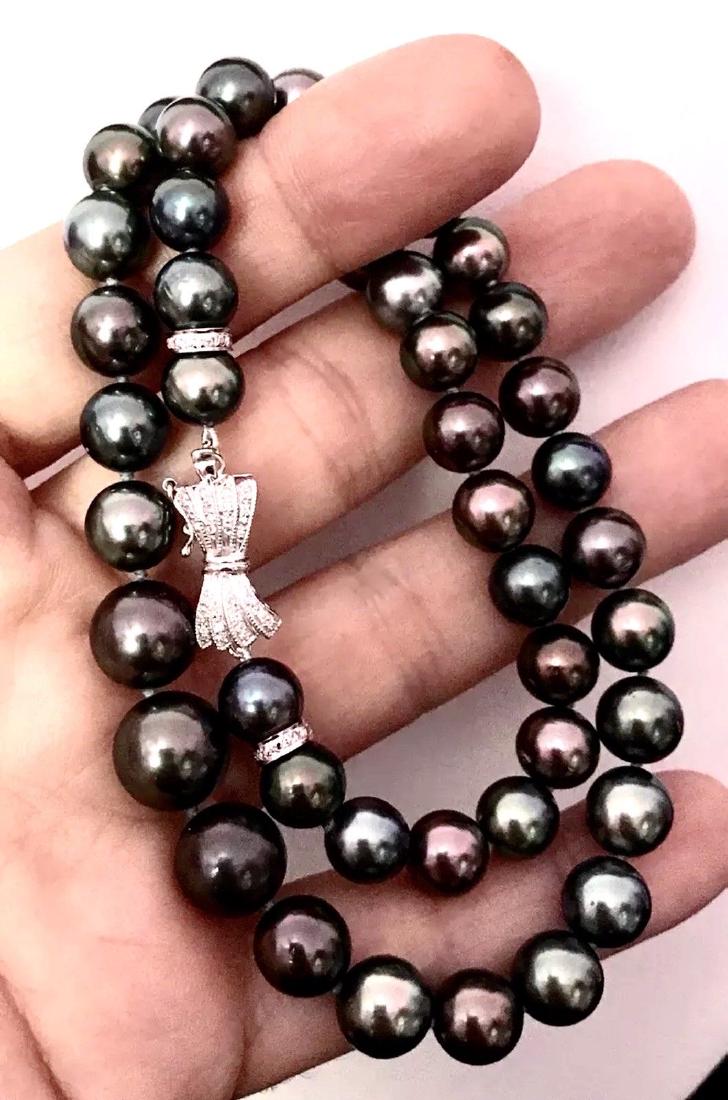CERTIFIED $15,950 Diamond & Tahitian Pearl 12MM 17.5": Certificate #201818068 This fine piece of jewelry has been evaluated and appraised for insurance purposes by: Gemological Appraisal Laboratory 580 Fifth Avenue Suite 2906 New York, NY 10036 ALL CERTIF