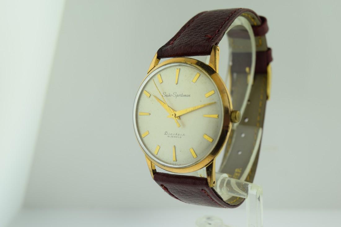 Vintage Early Seiko Sportsman Diashock 15 Jewels Watch: Item: Vintage Early Seiko Sportsman Diashock 15 Jewels Watch Brand: Seiko Date: 1960s Movement: Manual Case Metal: EGP front, stainless steel back Case Size: 34mm Bracelet Type: Leather strap Bracelet