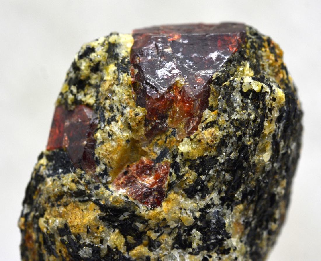 23 Grams Natural Zircon Specimen: No Reserve! Title: 23 Grams Natural Zircon Specimen Gemstones: Zircon Carat Weights: 23 Grams Size/Dimensions: 47x26x11 MM Additional Info: Natural Shipping: Domestic: Flat-rate of $12.00 DHL Global t