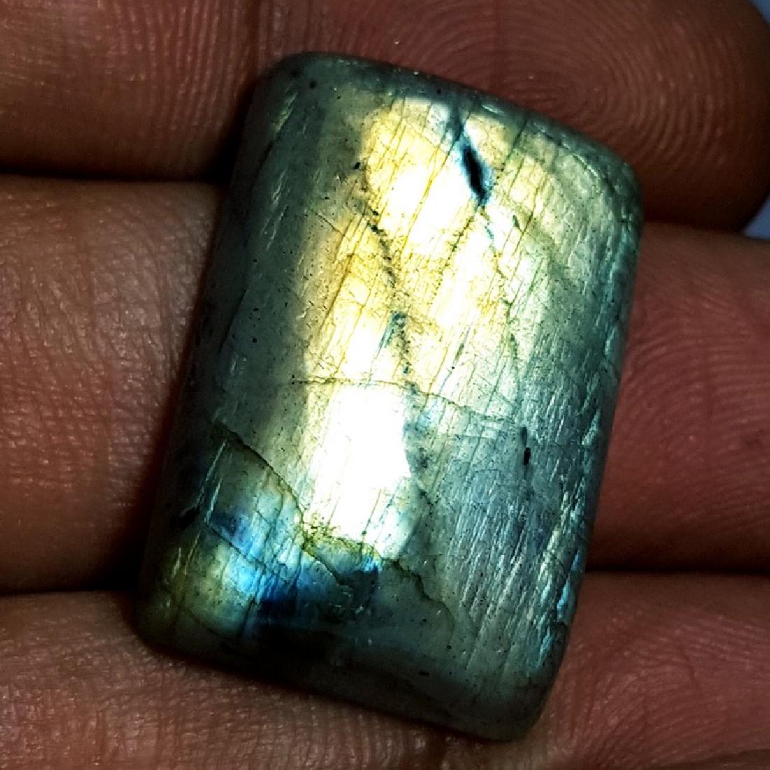 26.84 ct Natural Labradorite: No Reserve! Item: 26.84 ct Natural Labradorite Color/Clarity: Opaque Gemstones Carat Weights: 26.84 Size/Dimensions: 24.15 x 16.15 x 6.80 Rectangular - USA Shipping: Worldwide: Flat-rate of $10.00 to 