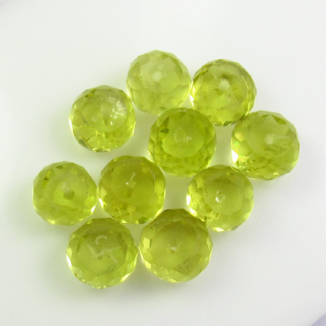 21.62 Ct Genuine 10 Drilled Round Lemon Quartz Beads: No Reserve! Item: 21.62 Ct Genuine 10 Drilled Round Lemon Quartz Beads Loose Gemstone: Natural Lemon Quartz Beads Stone Clarity: SI-VS Carat Weights: 21.62 Size/Dimensions: 7.0x4.5 to 7.7x5.5 mm / 10 