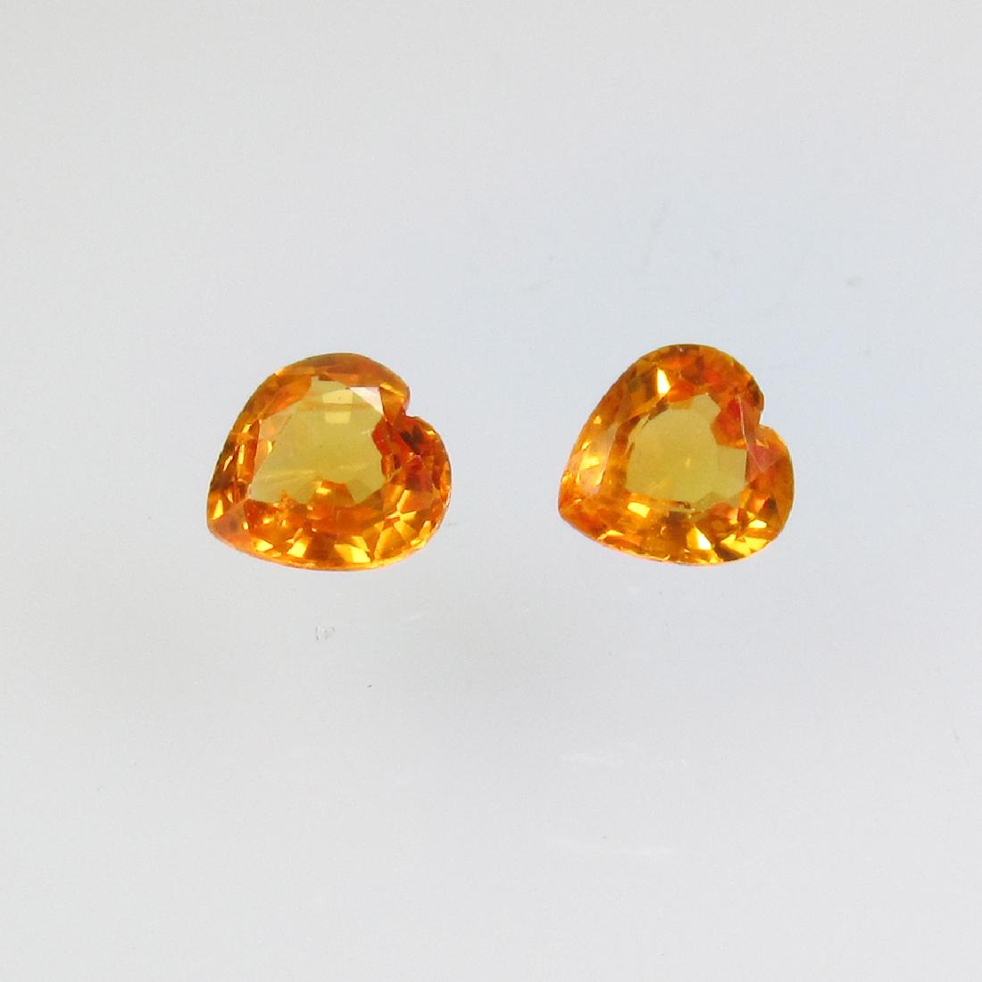 0.59 Ct Genuine Ceylon ORange Sapphire 4X4 mm Heart: No Reserve! Item: 0.59 Ct Genuine Ceylon ORange Sapphire 4X4 mm Heart Pair Loose Gemstone: Natural Orange Sapphire Pair Stone Clarity: VVS Carat Weights: 0.59 Size/Dimensions: 4.10 x 4.10 x 2.20 mm / 