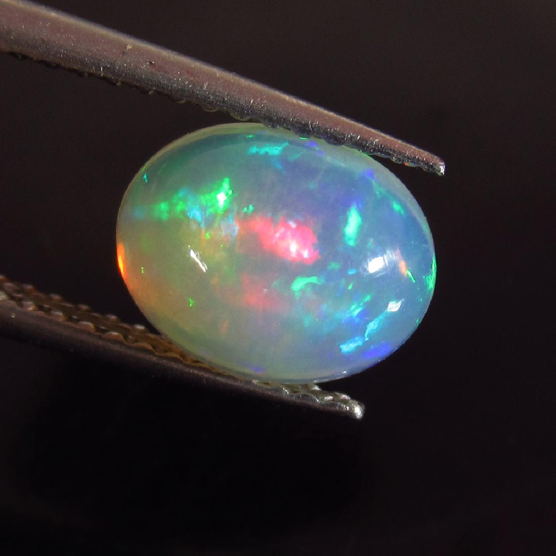1.16 Ctw Natural Ethiopian Fire Opal Oval Cabochon (1 of 3)