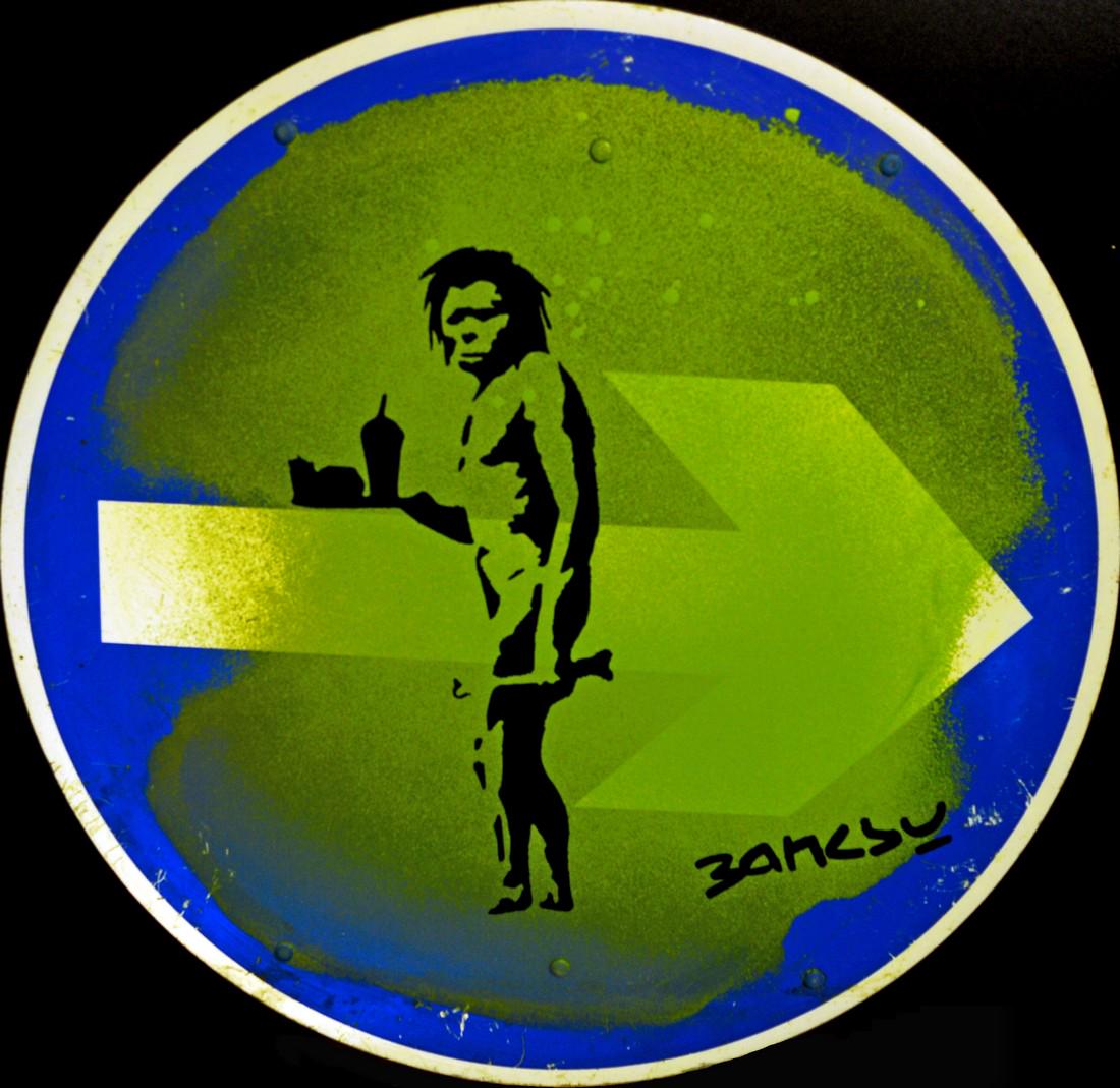 Banksy - Metal Road Sign - Cave Man 2018: Stencil Spray and Paint. Graffiti Art/StreetArt, after Banksy. On Traffic Direction Road Sign Vintage (please note that there are some scratches and marks on the sign, because this is a vintage road s