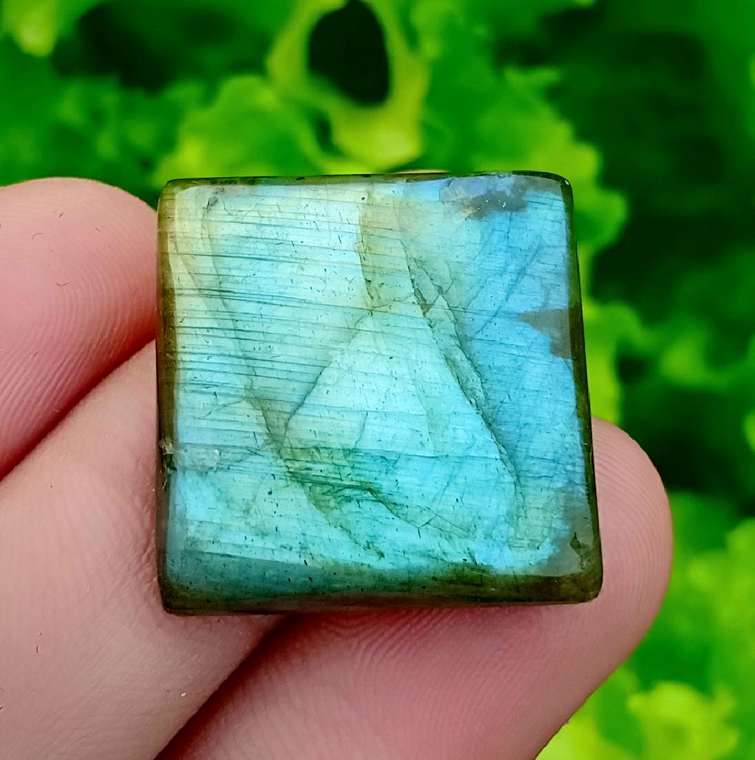 36.60 Carat Stunning Natural Labradorite Cab~ Africa: No Reserve! Item: 36.60 Carat Stunning Natural Labradorite Cab~ Africa Color/Clarity: None Gemstone: Labradorite Carat Weights: 36.60 Carat Size/Dimensions: 23x22x6 mm Origin: Africa Natural Shipping: