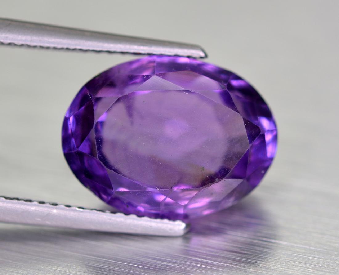 6.50 Carat Lovely Natural Amethyst Gemstone~ Brazil: No Reserve! Item: 6.50 Carat Lovely Natural Amethyst Gemstone~ Brazil Color/Clarity: VVS Gemstone: Amethyst Carat Weights: 6.50 Carat Size/Dimensions: 13x10x6.5 mm Origin: Brazil Natural Shipping: Dom