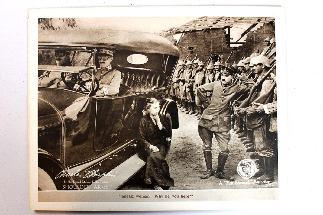 Shoulder Arms (Charles Chaplin Productions, 1918) Lobby: Description Shoulder Arms (Charles Chaplin Productions, 1918) Charlie is a boot camp private who has a dream of being a hero who goes on a daring mission behind enemy lines. Director: Charles Chaplin 