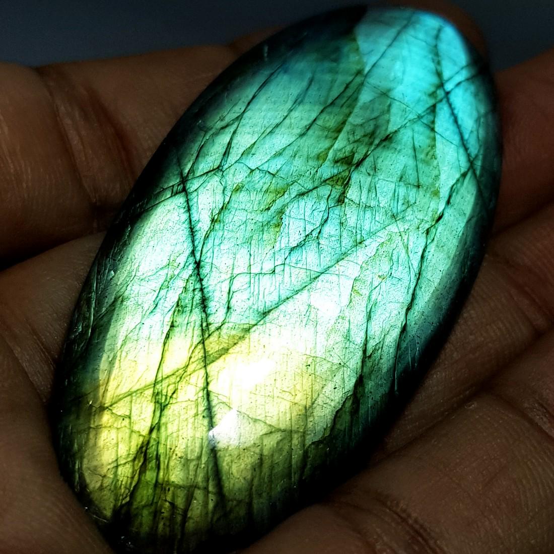 99.98 ct Natural Labradorite: No Reserve! Item: 99.98 ct Natural Labradorite Color/Clarity: Opaque Loose gemstone Carat Weights: 99.98 Size/Dimensions: 62.46 x 30.07 x 6.09 Oval - USA Shipping: Domestic: Flat-rate of $10.00 to any