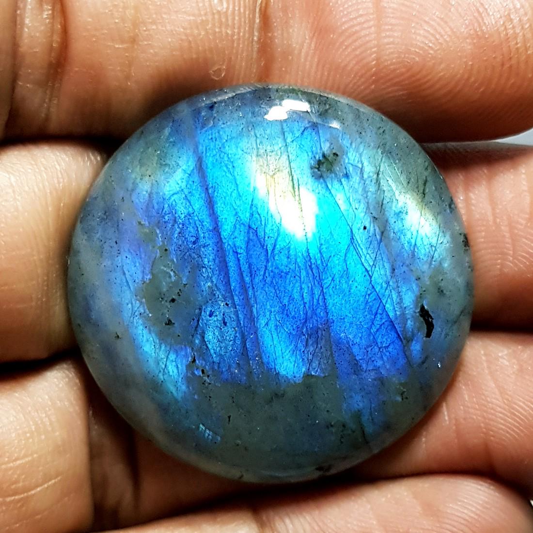 62.68 ct Natural Labradorite: No Reserve! Item: 62.68 ct Natural Labradorite Color/Clarity: Opaque Loose gemstone Carat Weights: 62.68 Size/Dimensions: 32.25 x 32.25 x 7.07 Round - USA Shipping: Domestic: Flat-rate of $10.00 to an