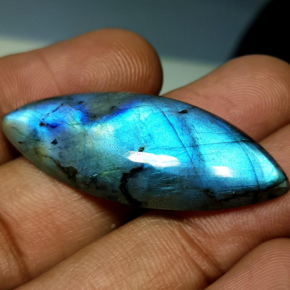 26.19 ct Natural Labradorite: No Reserve! Item: 26.19 ct Natural Labradorite Color/Clarity: Opaque Loose gemstone Carat Weights: 26.19 Size/Dimensions: 39.05 x 15.51 x 5.89 Marquise - USA Shipping: Domestic: Flat-rate of $10.00 to