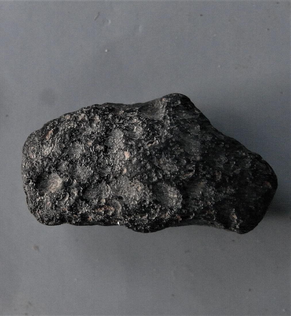 THAILANDITE TEKTITE - FROM METEORITE IMPACT: Title: THAILANDITE TEKTITE - FROM METEORITE IMPACT Origin: Noen Sa-Nga, Chaiyaphum Province, Thailand Size: 2.5x1x1 cm / 5 gram irregular shaped thailandite tektite with shallow ridges and pits. perfe