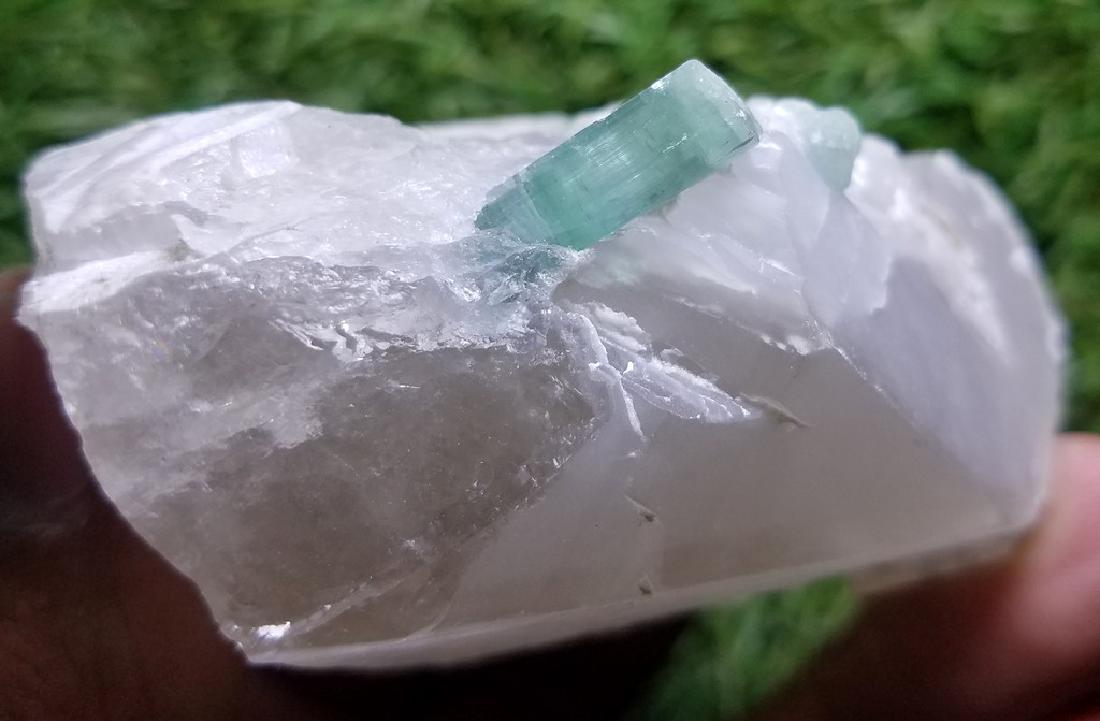 150 Grams Natural Sky Blu Tourmaline Specimen: Item: 150 Grams Natural Sky Blu Tourmaline Specimen Maker: 150 Grams Origin: Afghanistan Specimen Size: 71*52*36 MM Treatment: Natural Reserve: $30.00 Shipping: Domestic: Flat-rate of $25.00 DHL Expre